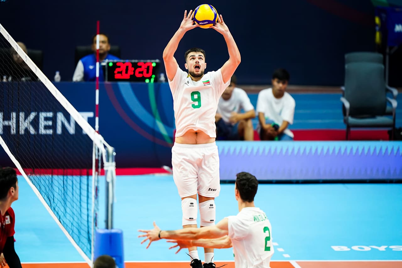Ivan Uzunov of Belgium sets up a play