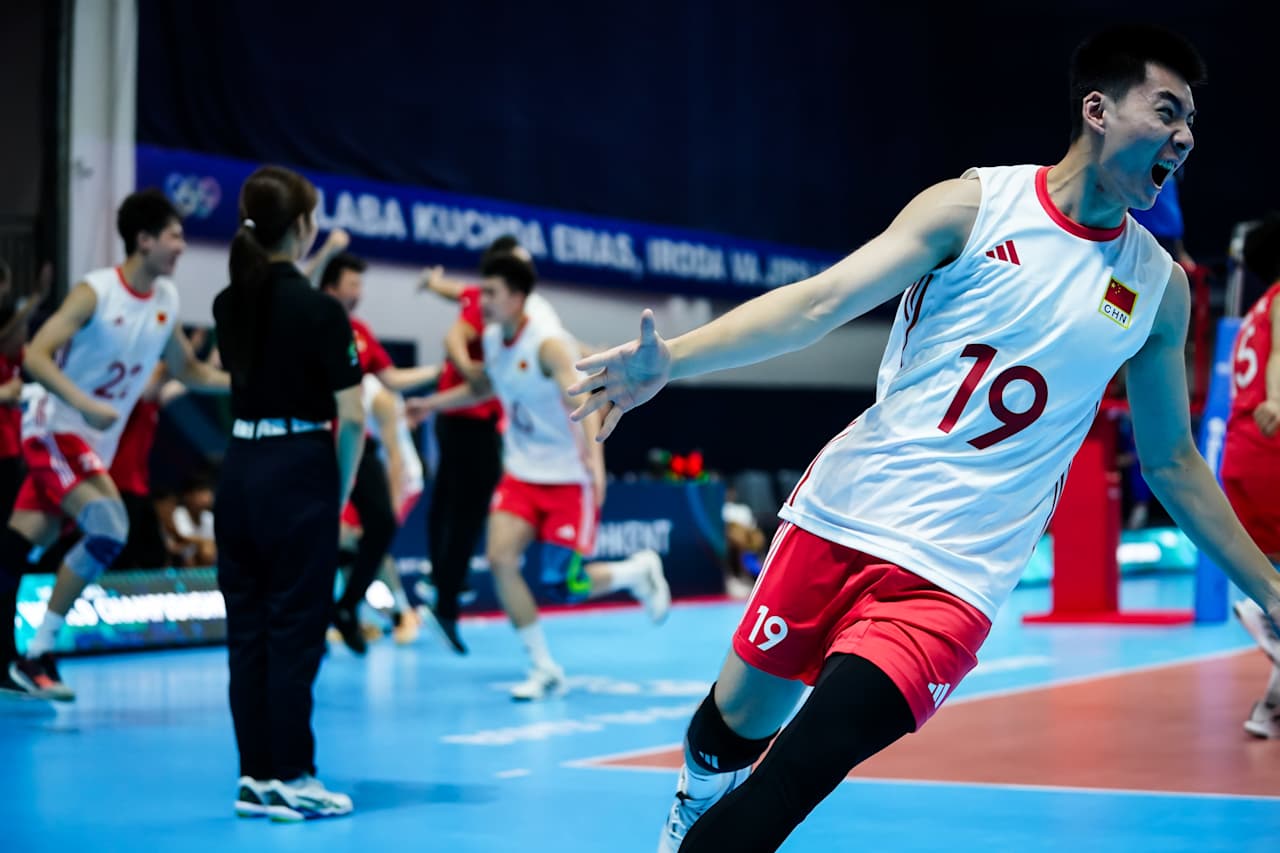 China's Qi Zheng celebrates a won point