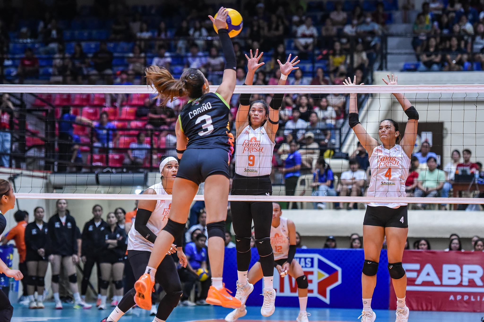 Nxled's Ennajie Laure-Cariño attacks the Farm Fresh defense